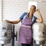 Maya-Camille Broussard leans on one of two commercial mixers