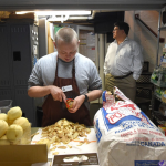 Stephen Wittstadt, who has autism, peels potatoes at Sam's Caterbury Cafe in Baltimore