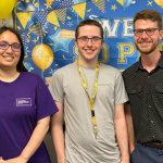 Spectrum Scholars Melissa Gatti and Andrew Martin, and Spectrum Scholars Program Manager Wes Garton, smile for the camera.